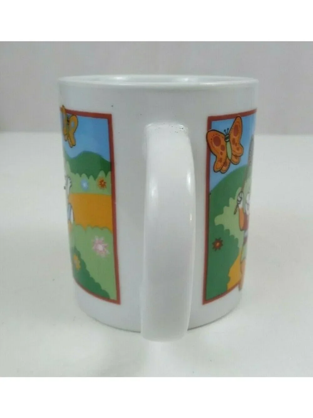 Vintage Easter Bunny Catching Butterflies Coffee Mug Cup 3.75